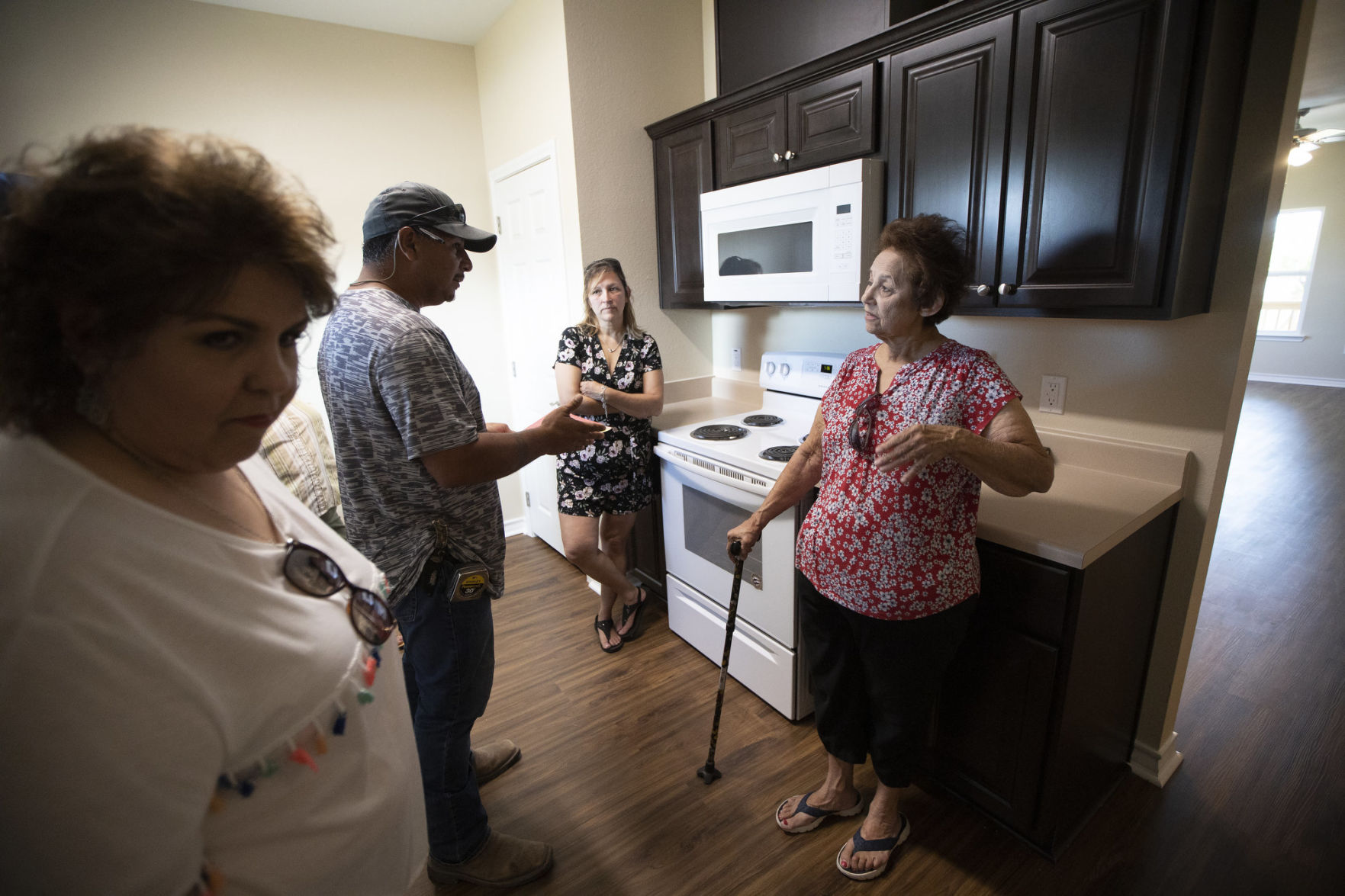 Austwell family receives keys to new home